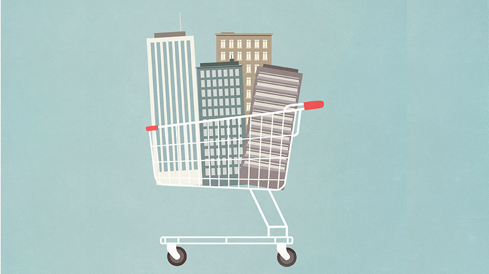 Stock art - buildings in a shopping cart