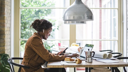 image of woman working at home