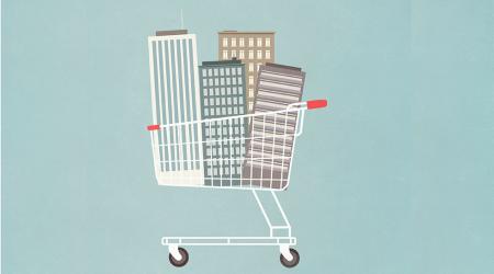 Stock art - buildings in a shopping cart